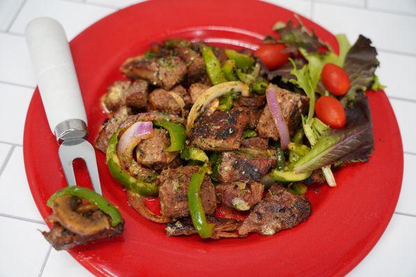 Steak bites with mushrooms, peppers, and onions