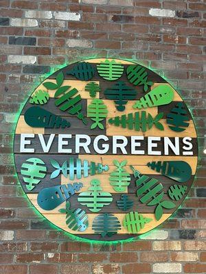 Evergreens wall logo inside