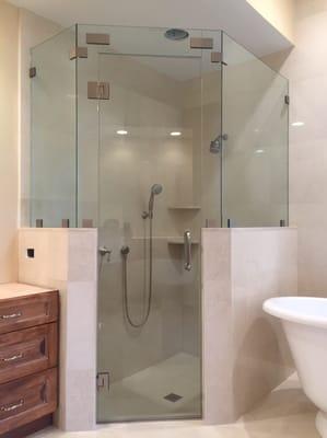 Mirrtique Inc. Glass & Mirror Co. Installed this custom frameless shower in Breakers West