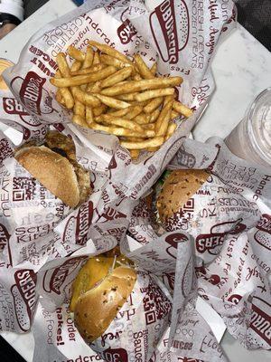 Cajun fried fish burger, Six Alarm Burger, the Gains Burger,  and Regular Fries.