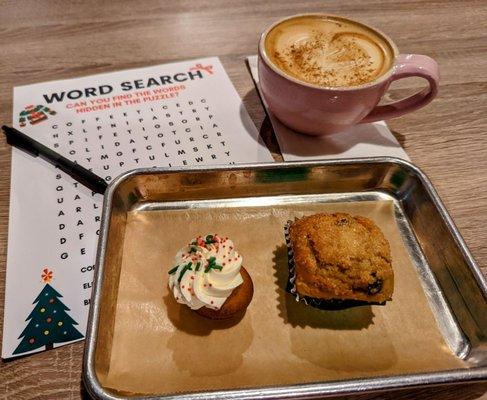 Italian buttercream sourdough bite and an orange cranberry mini loaf that was gluten friendly washed down by an oatmilk chai latte