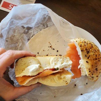 Lox sandwich on an everything bagel and scallion cream cheese