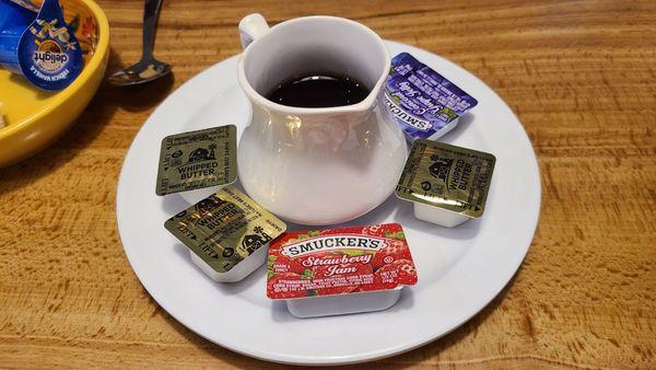 Condiments for pancakes. Decent syrup.