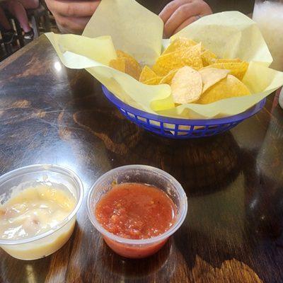 Chips salsa and cheese dip