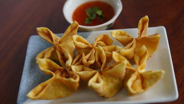 8. Crab Puffs
 Deep-fried wonton filled with imitation crab, cream cheese, onion and carrot. Served with homemade plum sauce.