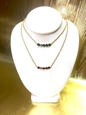 Emerald and ruby with diamond dot necklace.