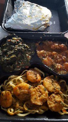 Curry shrimp with linguini, spinach, chutney, and roti