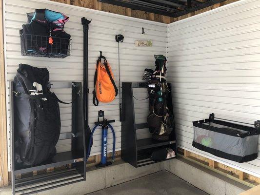 Paddle board and golf club storage.