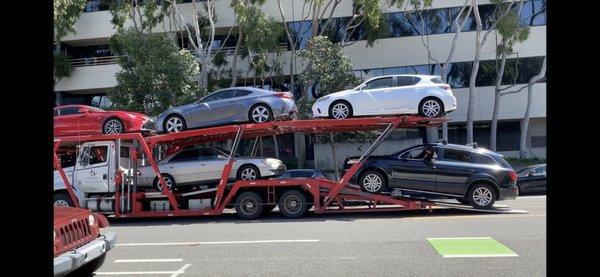 Loading up in Santa Monica near a dealership. The drivers often have to go to a place where they won't get bugged by parking enforcement.