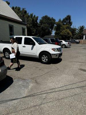 Parking lot, plenty of spaces + street parking in front and on the side.