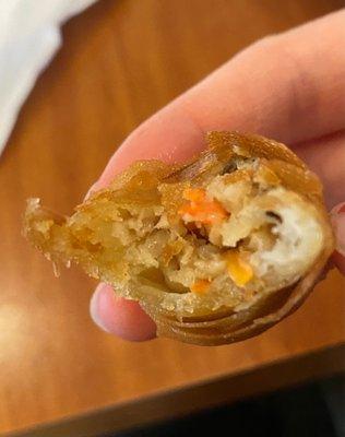 Inside of egg rolls. Warm & crispy. Fish sauce dip.