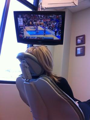 Watch TV during dental treatment at Dental Care Hillsborough.