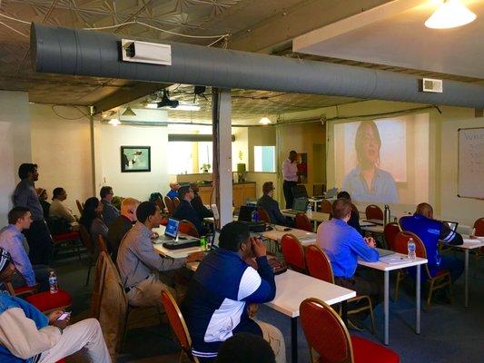 Demo Day - April 2018 - Graduates present capstone projects in front of employers.