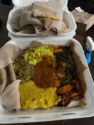 Vegetable combination with two extra injera.