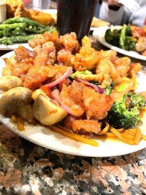 L to R- mushroom chicken, honey chicken, black pepper chicken, chicken and broccoli all on top of lo mein