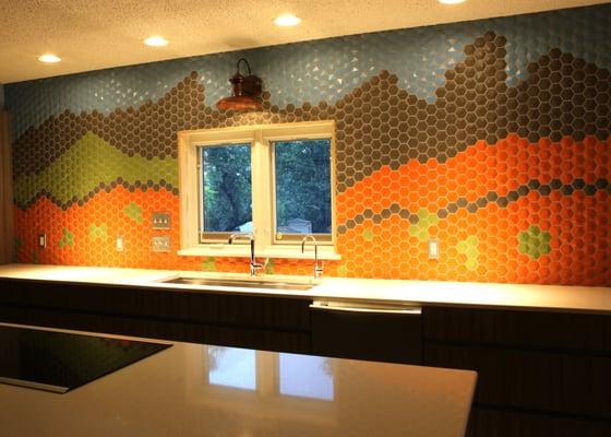 Have a idea in mind and want it created; we can do that.  This is an example of an installation we did with hexagonal ceramic tile.