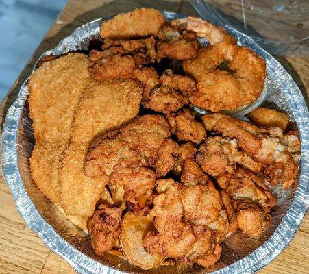 Fisherman's Platter ($14.95) w. Flounder, Shrimp, Scallops, Clams, fresh chips & coleslaw.