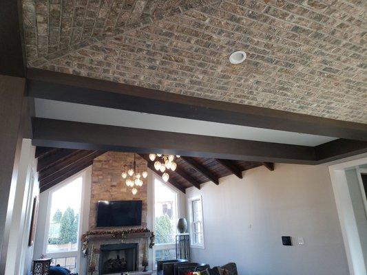 Attention to detail. Stacy from Reddington Designs, designed the beams to wrap around the farmhouse concept