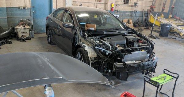 2017 Nissan Altima Being Repaired After A Bad Front End Collision