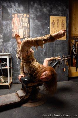 Contortionist, Cheryl Birch showing off our medical props