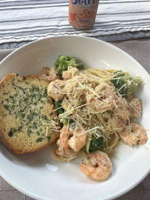 Shrimp scampi and garlic bread.  Made by Sammy