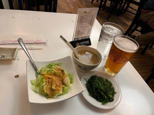 House salad, seaweed salad. Miso soup and draft beer