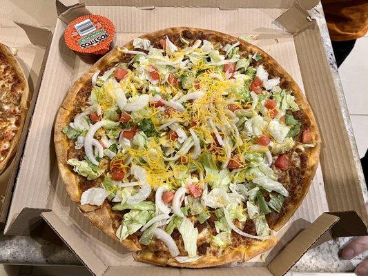 Large thin crust Beef Taco Pizza.  Excellent, but the onions were a little skunky.  Recommended if your tired of traditional.