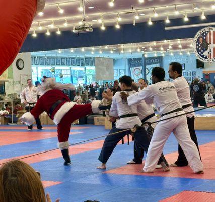 Grand master Park brakes 8 boards in a Santa suit at the holiday party!!