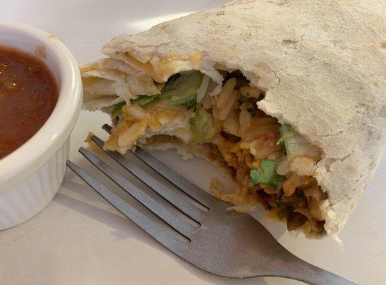 Steak burrito. By hands, no fork or knife.