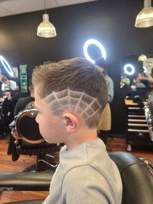 We love doing kids haircuts and designs! Haircut by Logan