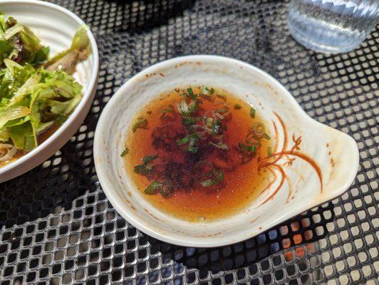 Colored water for tempura dipping sauce. Had no flavor, hardly even considered salty