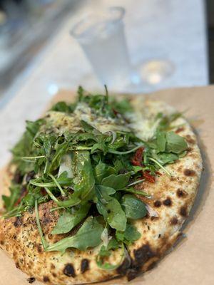 Focaccia arugula shaved parm etc pizza on the menu