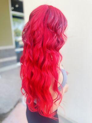 Vibrant red hair with custom colored hand tied hair extensions by Allie!