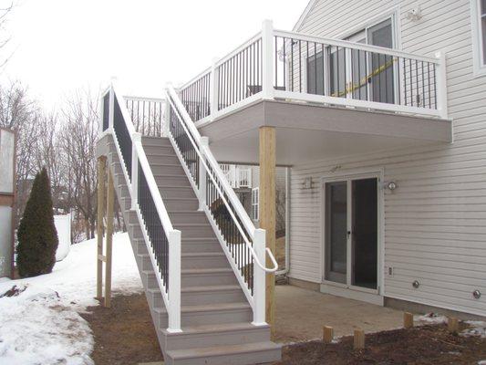 Second story deck, steps and railing -- all maintenance-free.