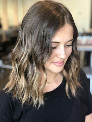 Beautiful dimensional hair color with a textured lob.