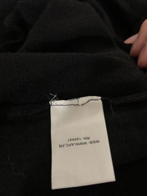 Uneven stitching on care tag