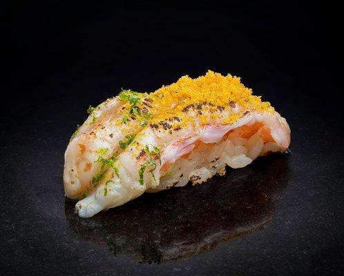 Japanese Jumbo Sweet Shrimp topped with Bottarge and Lime Zest.