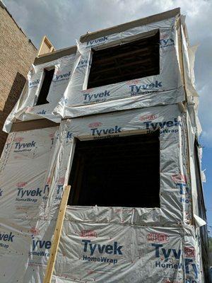 Rough framing, insulation and  siding