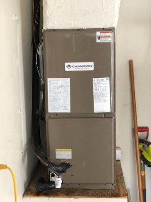 Champion Air Handler on Platform in Garage