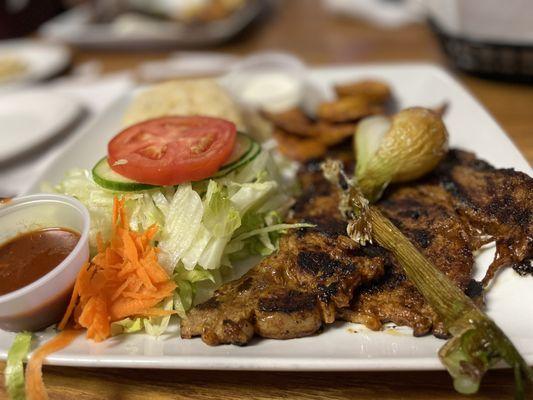 Charussco with rice plantains and salad