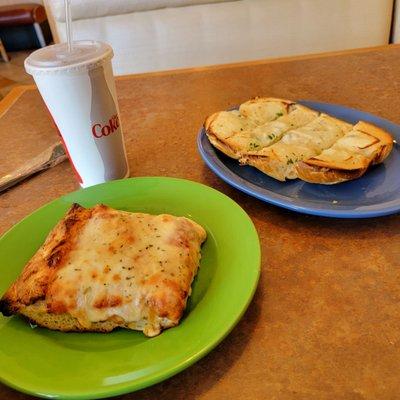 Garlic bread in top, and cheese pizza in bottom