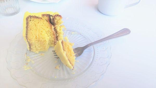 Lemon cake with lemon curd and the creamiest yellow frosting