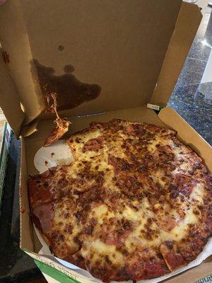 One pizza was delivered completely smashed