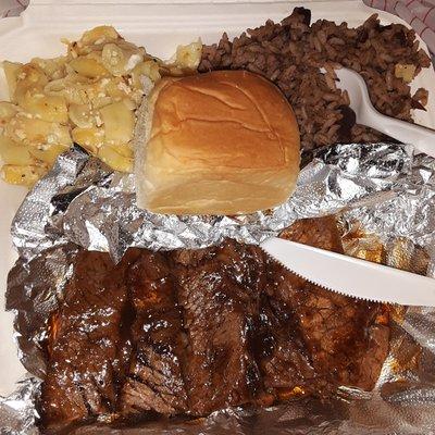 Beef Brisket w/red beans & rice and mac & cheese. $15.