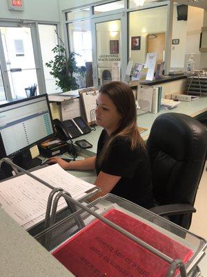 Kelli, front desk