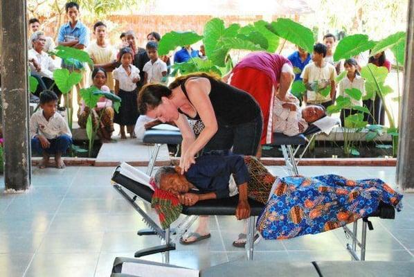 Dr. Laura adjsuting at a orphange in Cambodia