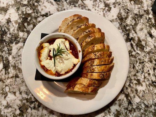 Fire roasted baked goat cheese dip with seeded baguette