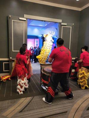 Entrance to the dinner with lion dance performers