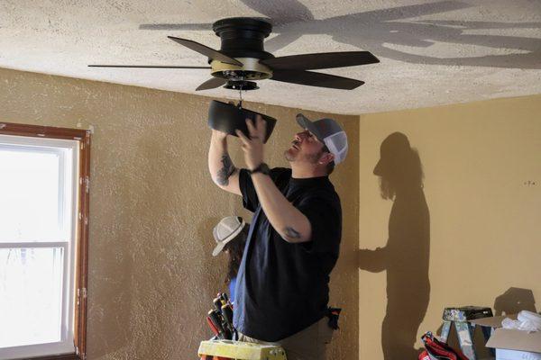 Installing a brand new ceiling fan.