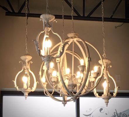 This chandelier over a corner seating area, beignets, and a jazzy soundtrack hint at PJ's New Orleans heritage.